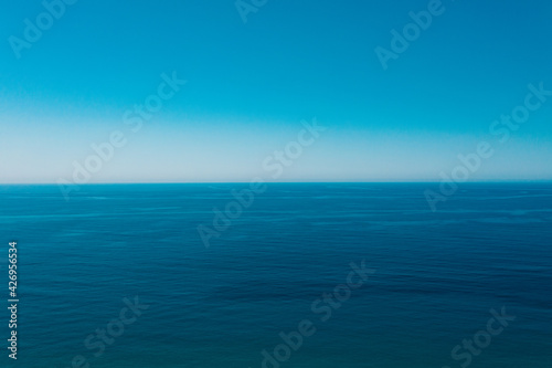 Summer sunny day, blue sky, white clouds and water sea background. Blue Sky Background.