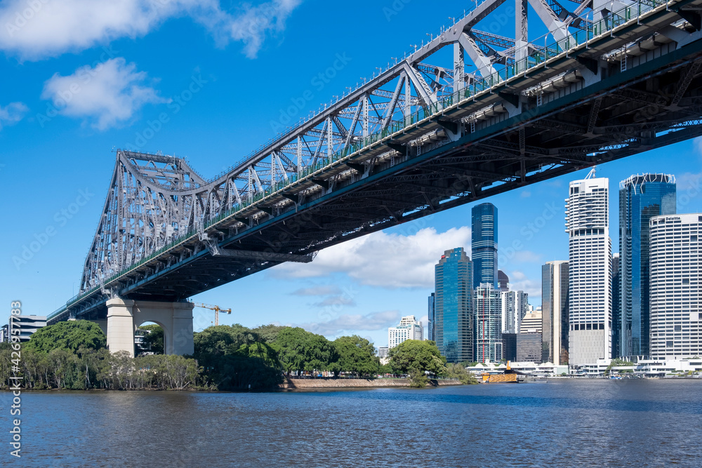 Fototapeta premium The Story Bridge over the Brisbane River with the Brisbane skyline in the background underneath