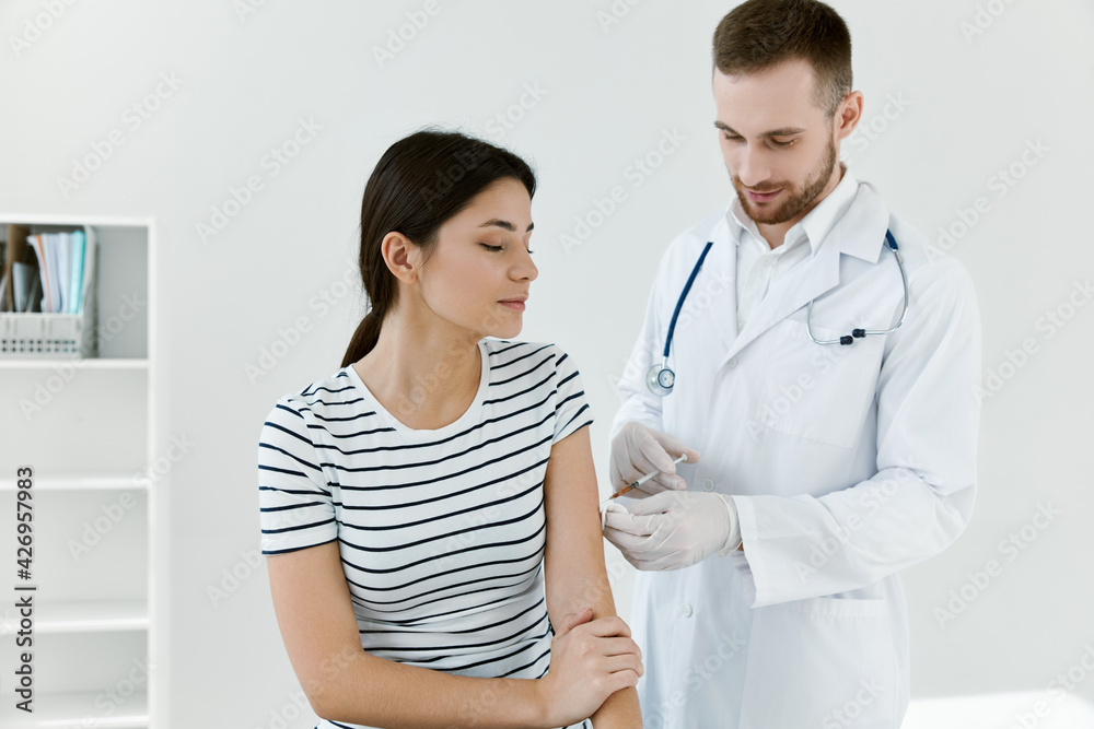 doctor injections into patient's arm health treatment covid vaccination doctor injections into patient's arm health treatment covid vaccination
