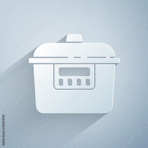 Paper cut Slow cooker icon isolated on grey background. Electric pan. Paper art style. Vector