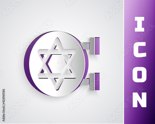 Paper cut Jewish synagogue building or jewish temple icon isolated on grey background. Hebrew or judaism construction with David star. Paper art style. Vector