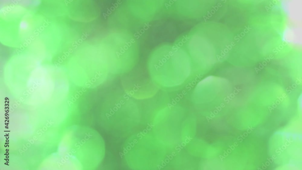 Blinking bokeh loopable background. Motion background light beams and rising blinking particles.