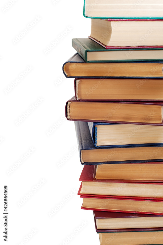 Stack of old books isolated on white background. Vertical photo Stack of old books isolated on white background. Vertical photo