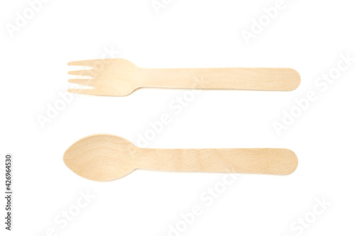 Wooden spoon and fork isolated on white background. 