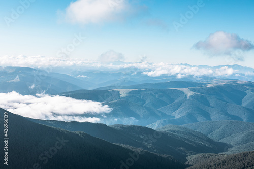 landscape view of mountains with clouds