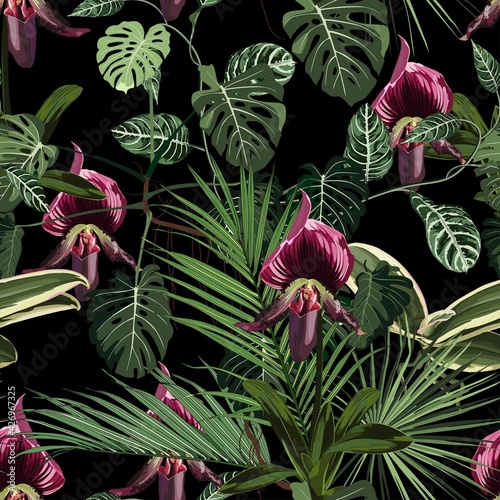 Exotic flowers seamless pattern. Tropical yellow brown orchid flowers and palm leaves in summer print. Hawaiian t-shirt and swimwear tile. Black background.