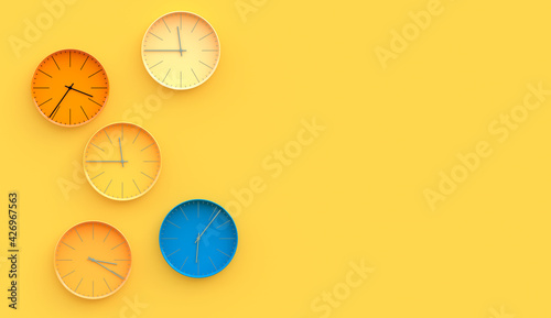 Fototapeta Naklejka Na Ścianę i Meble -  Simple multicolor wall clock with different time on yellow background