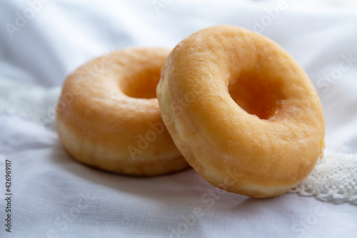 delicious sugary donuts on the tablecloth © tetxu