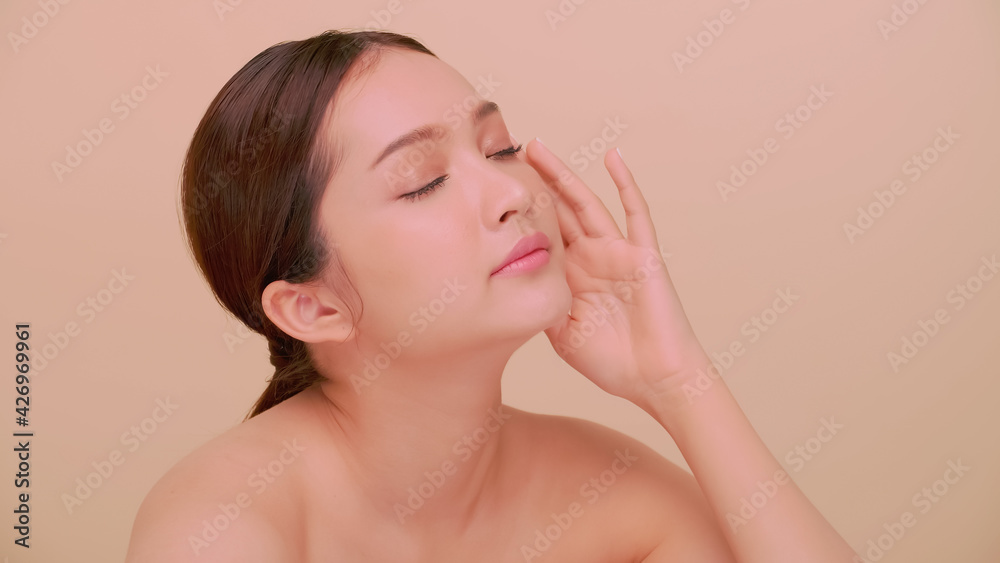 Beautiful face of Asian young woman with natural skin. Portrait of attractive girl with soft makeup and perfectly beautiful skin. Beautiful face of Asian young woman with natural skin. Portrait of attractive girl with soft makeup and perfectly beautiful skin.