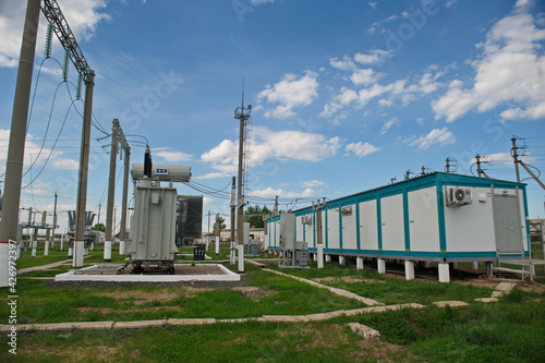 Nur-Sultan, Kazakhstan - 05.28.2015 : High-voltage power lines with insulators, stabilizers and transformers.