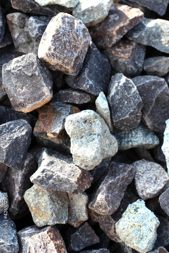 The results of grinding andesite from the mountains are converted into small particles as building materials with a size of 0.5 cm.
