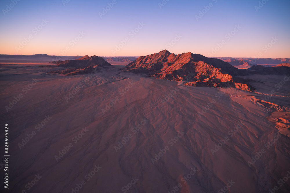 Naklejka premium Amazing nature texture, aerial view of the red desert in Namibia, Africa.