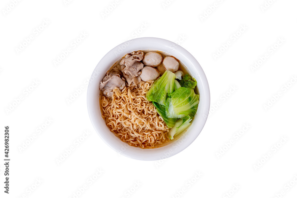 Instant noodles, Chinese cabbage, pork, pork meatballs in a ceramic bowl on a white wooden floor, top view. with clipping path. Instant noodles, Chinese cabbage, pork, pork meatballs in a ceramic bowl on a white wooden floor, top view. with clipping path.