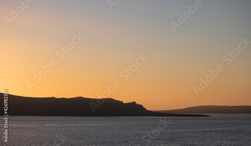Beautiful sunset over Langebaan Lagoon and Mountains on Cape West Coast of South Africa. photo