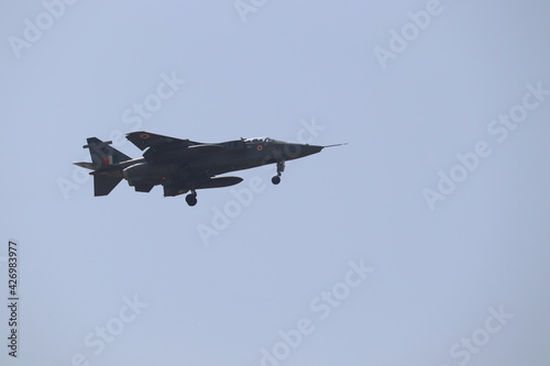 New Delhi, Delhi India- April 07 2021: Supersonic fighter jet plane flying in the clear sky with the pointed nose and missiles. Rafale and Sukhoi are top Indian Air Force armor.