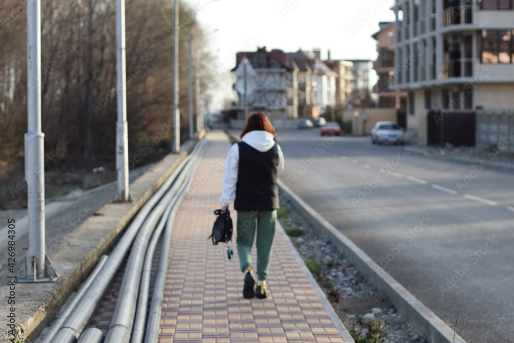 woman walking on the street