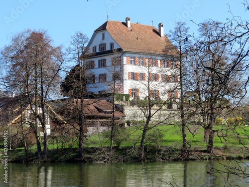 Castle Mauensee (Schloss Mauensee) on a small lake island in a Lake Mauen (Mauesee) - Canton of Lucerne, Switzerland (Schweiz) photo