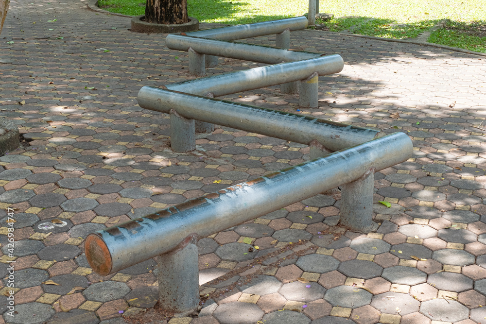 Iron Gymnastics Balance Beam at Outdoor amusement park.,Niels Larsen Floor Balance Bar. Iron Gymnastics Balance Beam at Outdoor amusement park.,Niels Larsen Floor Balance Bar.