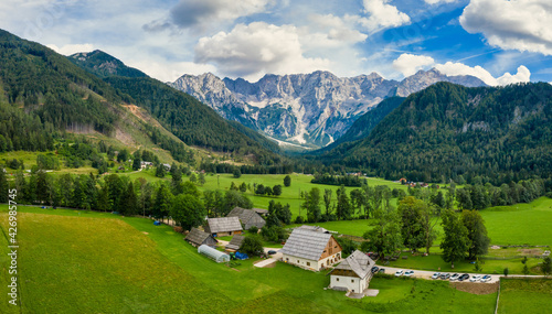 Aerial view of Alpine valley with farmhouse in Jezersko, Slovenia photo