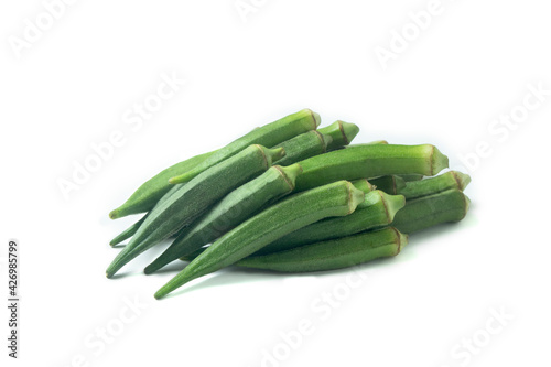 Indian vegetable named lady finger called Bhindi or fresh okra isolated on a black textured background