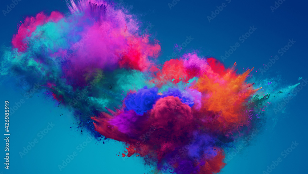 Cloud of colorful purple and blue powder explosion