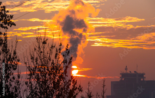 smoke factory sunrise big sun