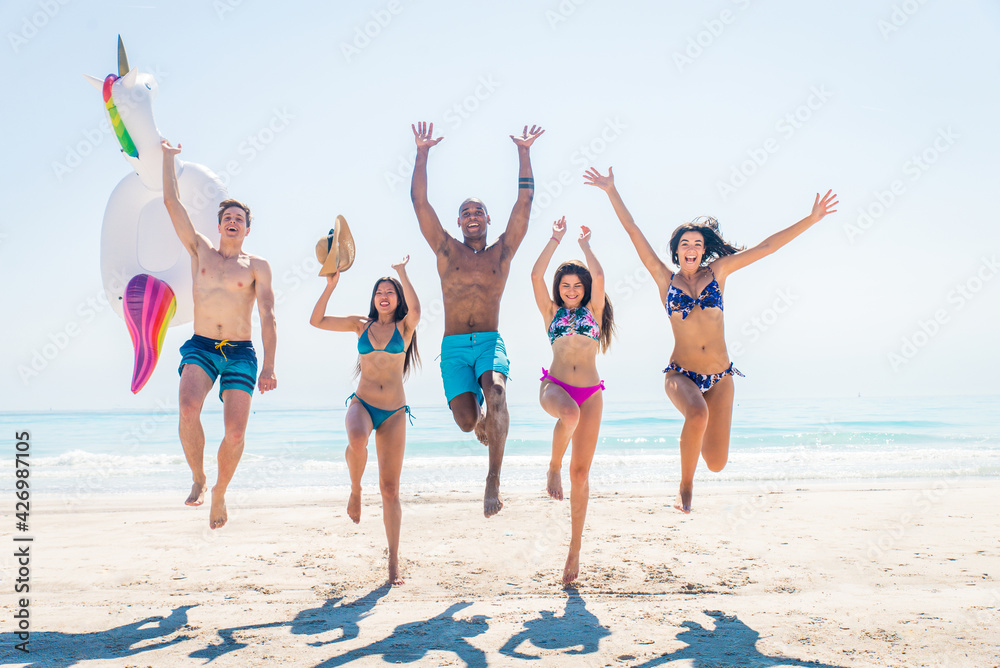 Friends having fun on the beach