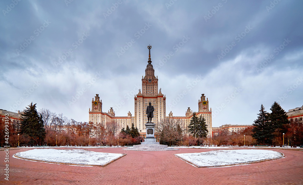 Obraz premium Panoramic view of dramatic clouds over spring campus of famous Russian university in Moscow
