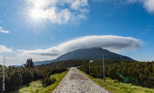 Long mountain trail with panorama of Karkonosze Giant Mountains around