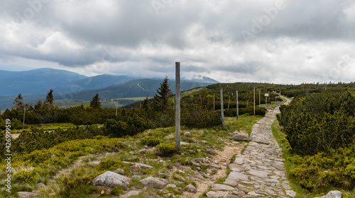 Long mountain trail with panorama of Karkonosze Giant Mountains around