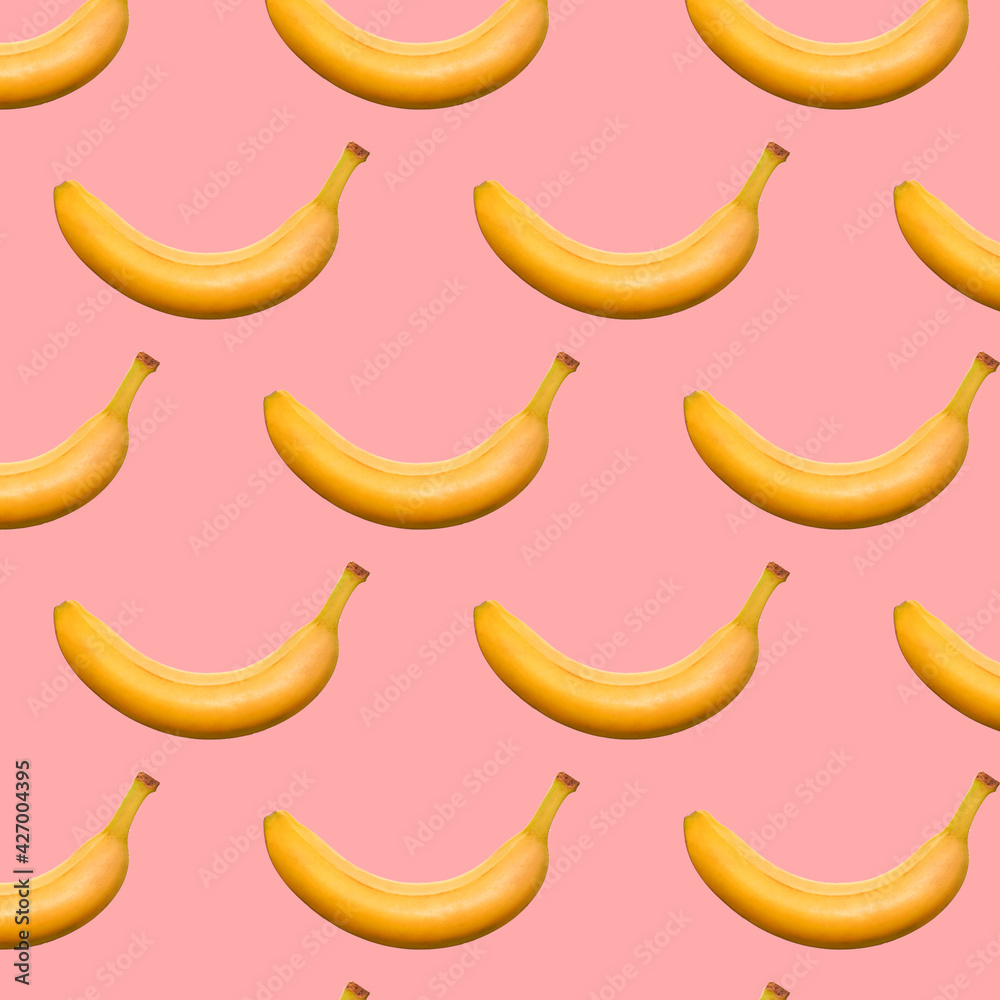 Banana seamless pattern on pastel pink background. Trendy colors Summer tropical exotic fruit pattern, concept. Nature background., gift wrapping paper, textile print design.