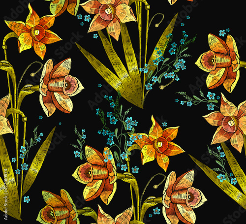 Embroidery yellow narcissuses flowers and meadow herbs. Seamless pattern. Fashion template for clothes, textiles, t-shirt design. Spring background. Botanical vector illustration
