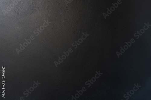 Background and textured of Interior cement wall with black color paint.