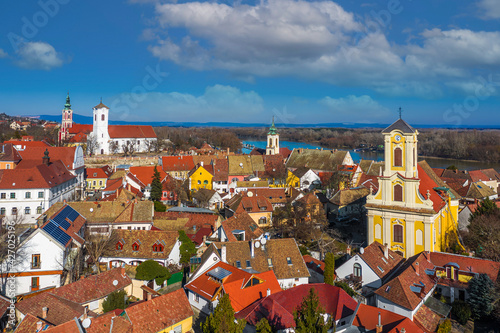 Wallpaper Mural Szentendre, hungary - Aerial view of the city of Szentendre on a sunny day with Belgrade Serbian Orthodox Cathedral, Saint John the Baptist's Parish Church, Saint Peter and Paul Church and blue sky Torontodigital.ca