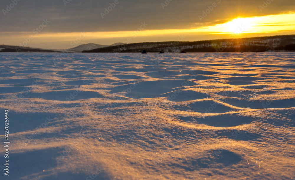 Russia. South of the Krasnoyarsk Territory, Winter dawn on the snow-covered lake Bolshoe near the village of Parnaya.