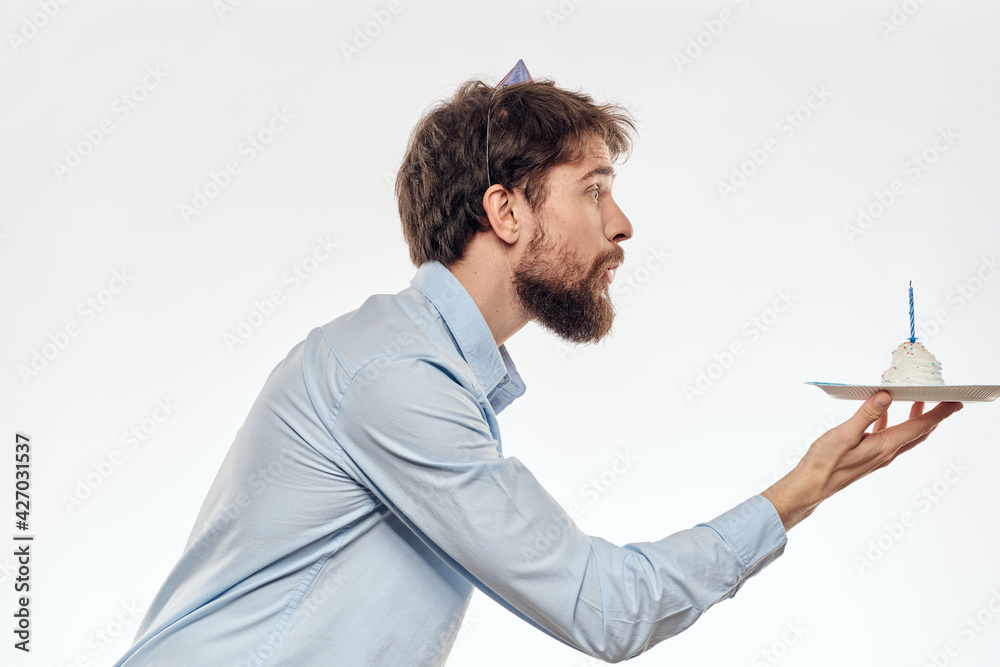 Happy guy with birthday cake white background Compact corporate party cropped beard view