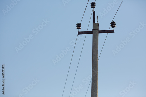 Pole with power wires. Pole and wires.