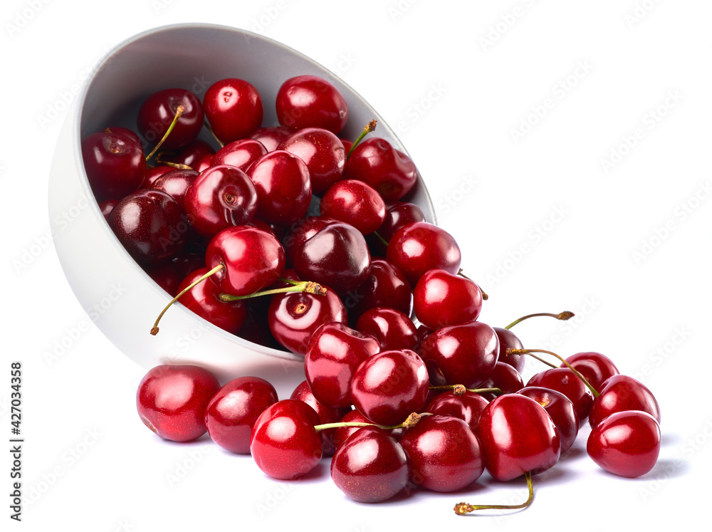Fototapeta premium white caeramic bowl of sweet cherry fruits isolated on white background