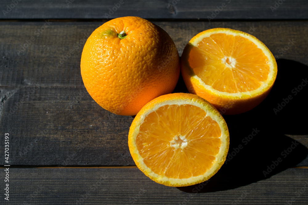 oranges on a wooden table oranges on a wooden table