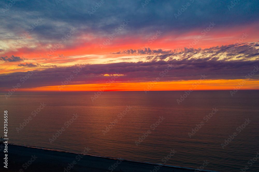 Beautiful orange sunset view from drone