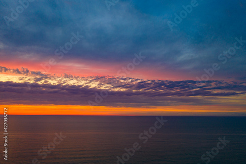 Beautiful orange sunset view from drone © Dmitrii