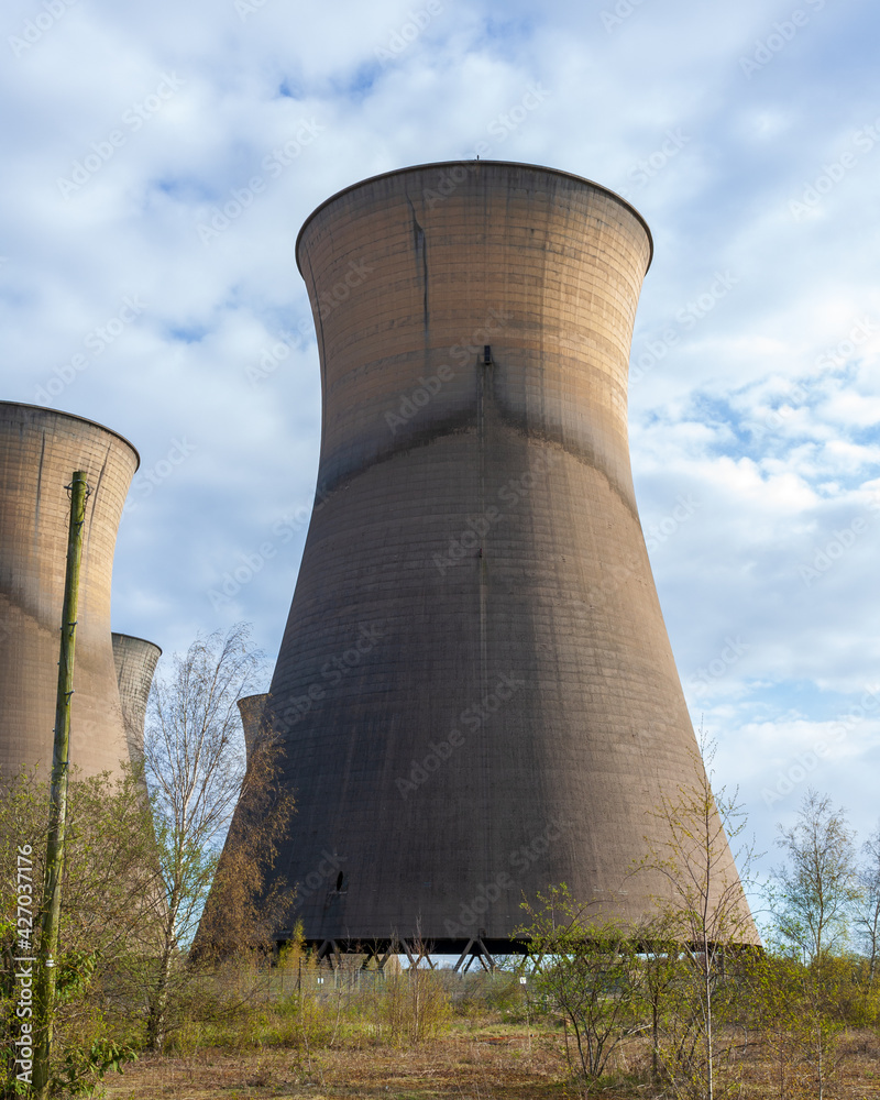 Willington, Derby, UK, April,11,2021:The Imposing Architectural Structure of the Disused Cooling Towers at Willington Derbyshire. Willington, Derby, UK, April,11,2021:The Imposing Architectural Structure of the Disused Cooling Towers at Willington Derbyshire.