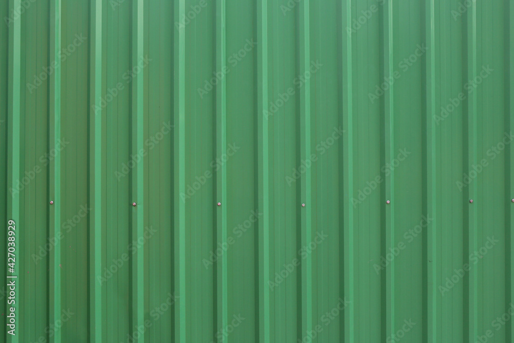 Green metal sheet wall background,galvanized texture backdrop for design in your work.