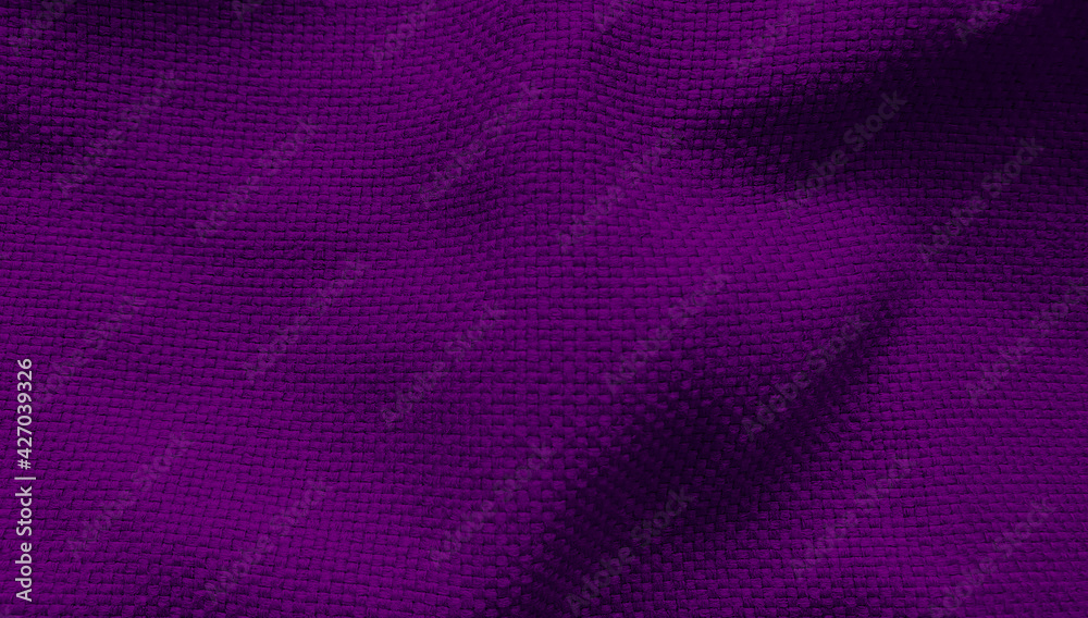 purple or violet crumpled textile fabric for luxury mood and tone. synthetic cloth as a background close-up. contrasting folds of fabric. purple or violet crumpled textile fabric for luxury mood and tone. synthetic cloth as a background close-up. contrasting folds of fabric.