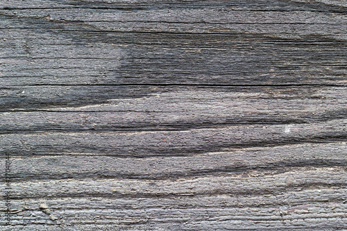 Gray board, wood texture, wooden background, damaged, cracked.