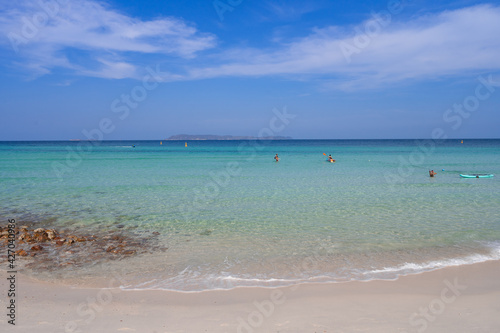 clear blue sea beach with small calm wave island, rocks on beach, clear blue sky, relax travel destination  at Thian beach, Koh Larn island, Thailand © Thitiporn