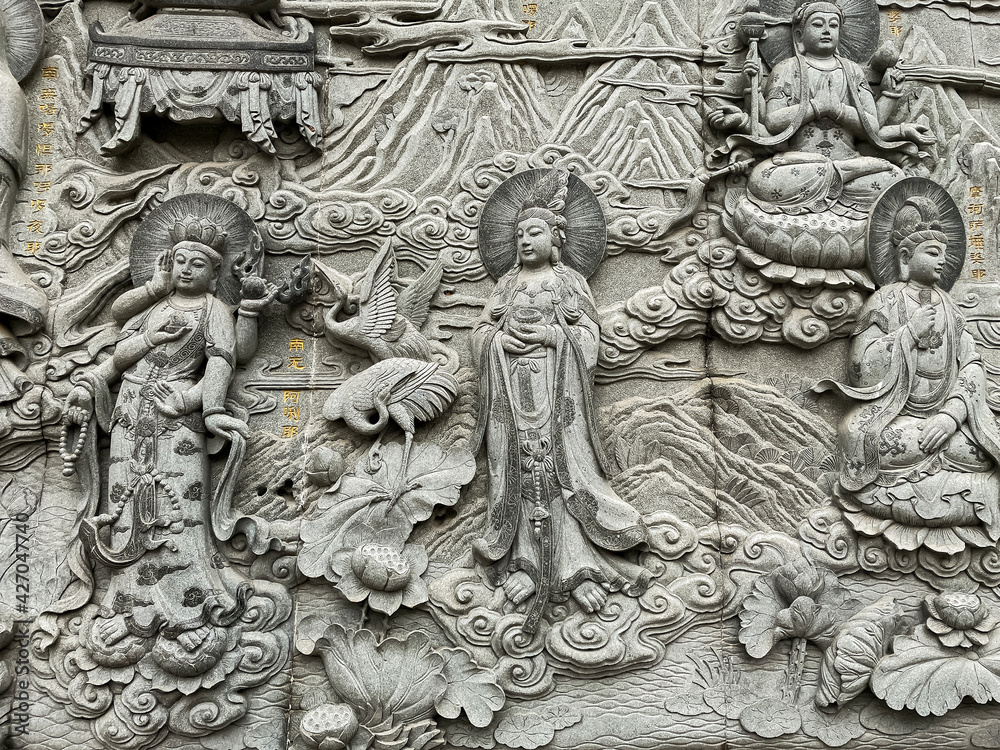 Carvings on a wall of Linguang monastery at Badachu near Beijing, China