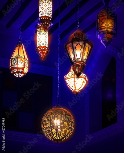 Lantern decor. Ramadan Kareem concept. Dark background. Selective focus.