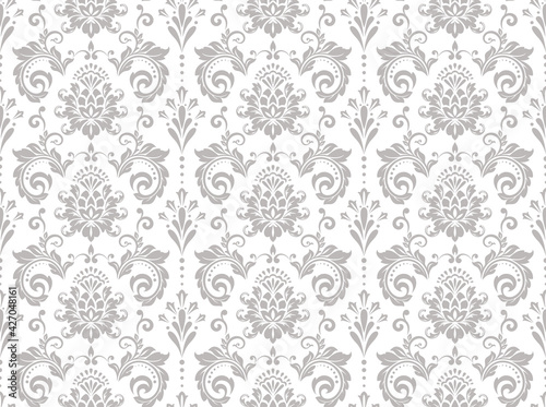 Wallpaper in the style of Baroque. Seamless vector background. White and gray floral ornament. Graphic pattern for fabric, wallpaper, packaging. Ornate Damask flower ornament.