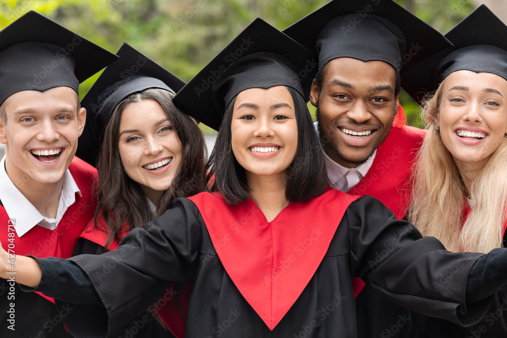 Φωτογραφία Happy multiracial group of students taking selfie, closeup